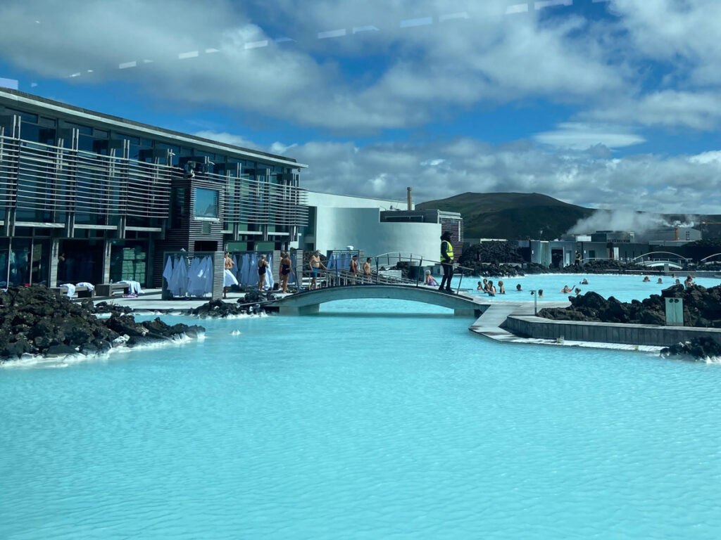 image shows the milky blue water of the blue lagoon with the main building to the left